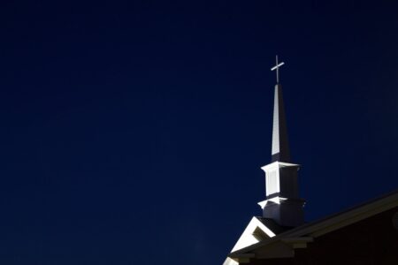 low angle view of cross against sky at night